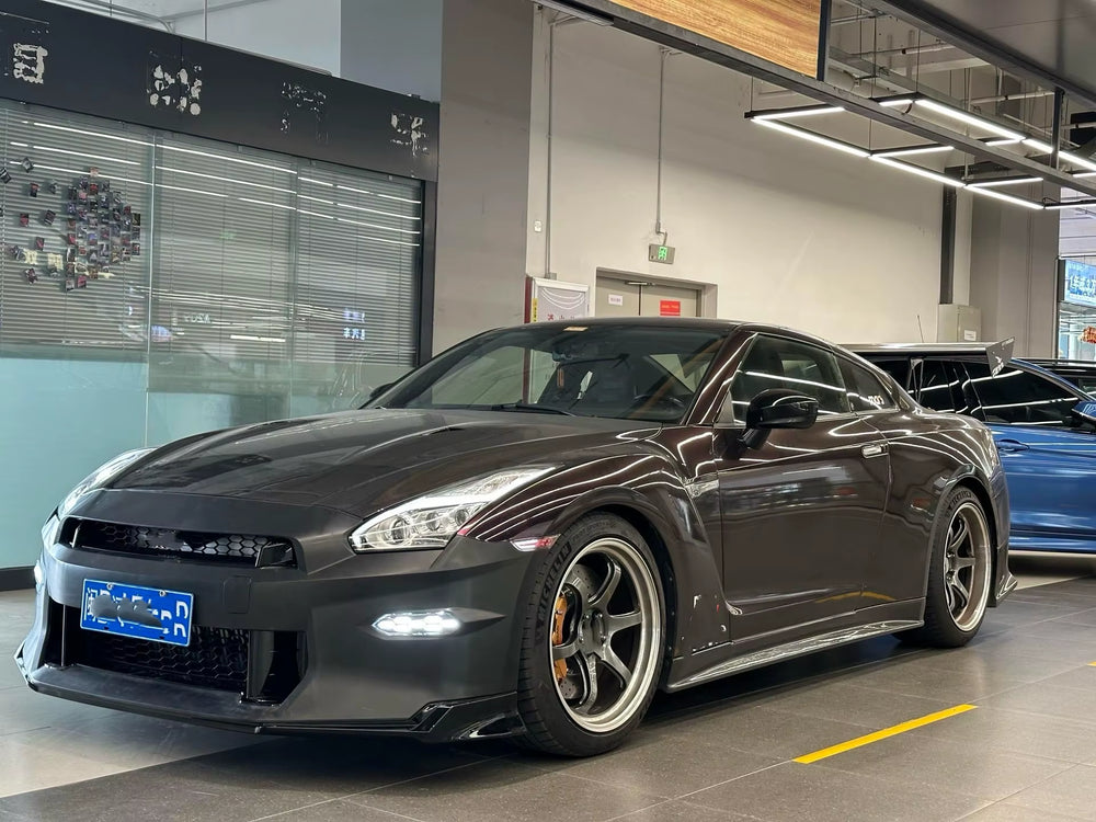 TCP Style of Pp Material Is Used for Nissan Gtr 35 2024 Front and Rear Bumper Diffuser Spoiler Hood Body Kit.