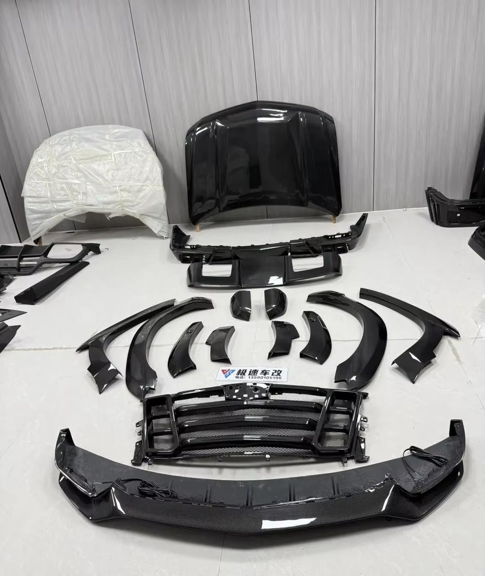 LD Style Carbon Fiber Body Kit for Cadillac Escalade - Front Lip, Rear Diffuser, Spoiler, Hood Grill, and Wide Body Components